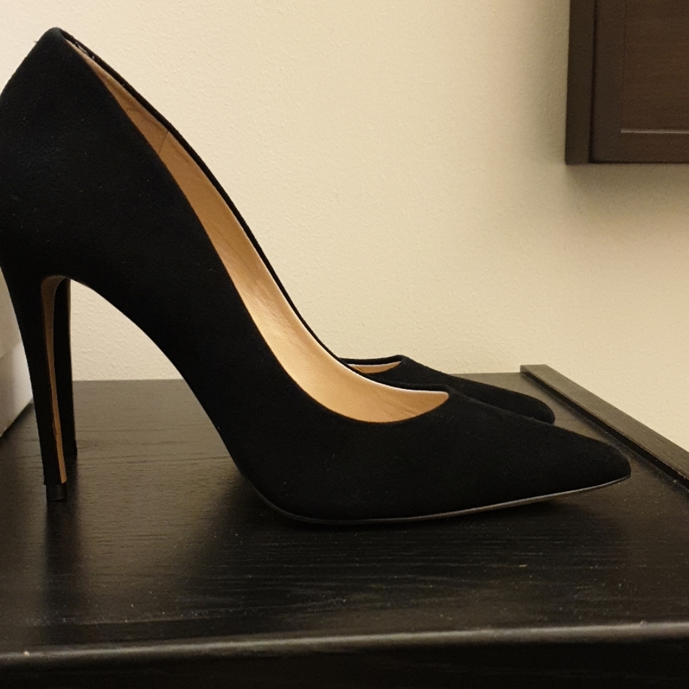 Black stiletto suede pumps